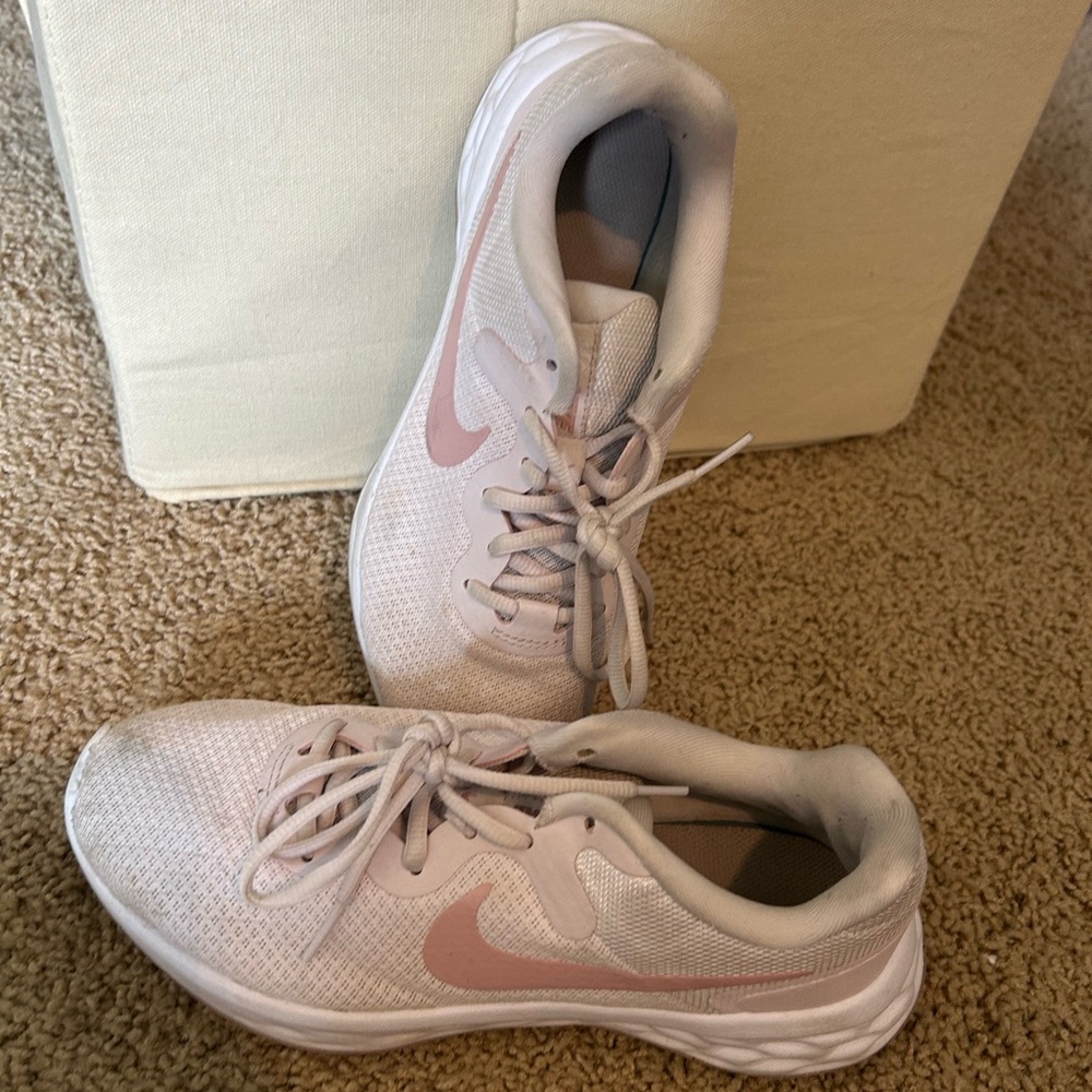 Nike Pink Athletic Shoes with Metallic Swoosh